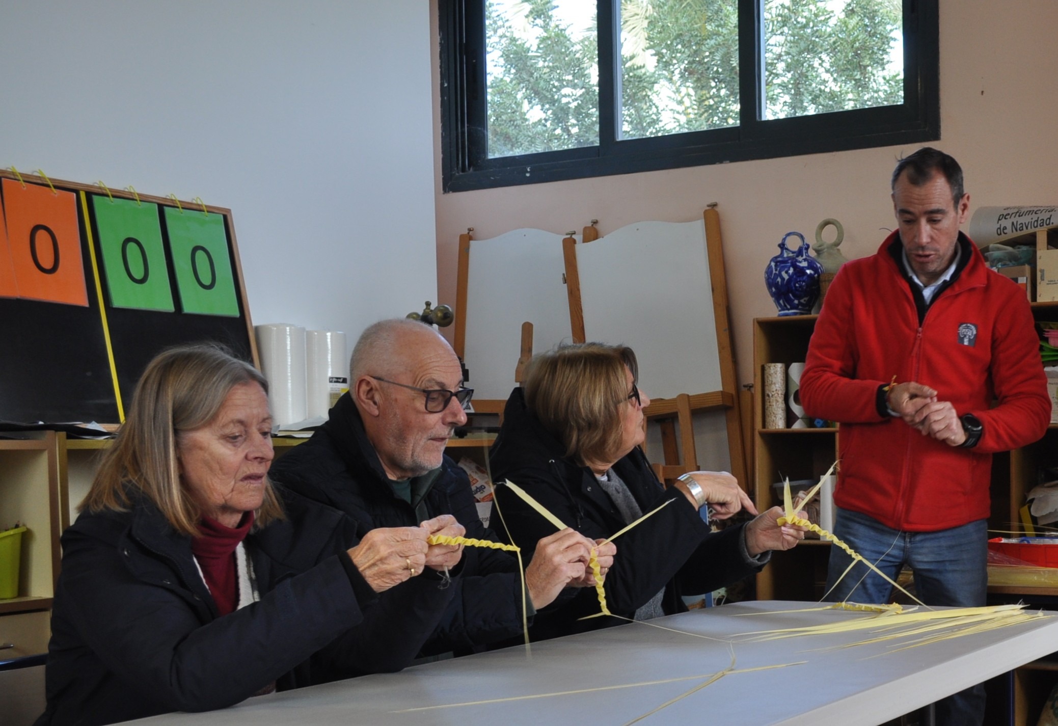 Members reveal their creative talents in the White Palm Weaving Workshop!